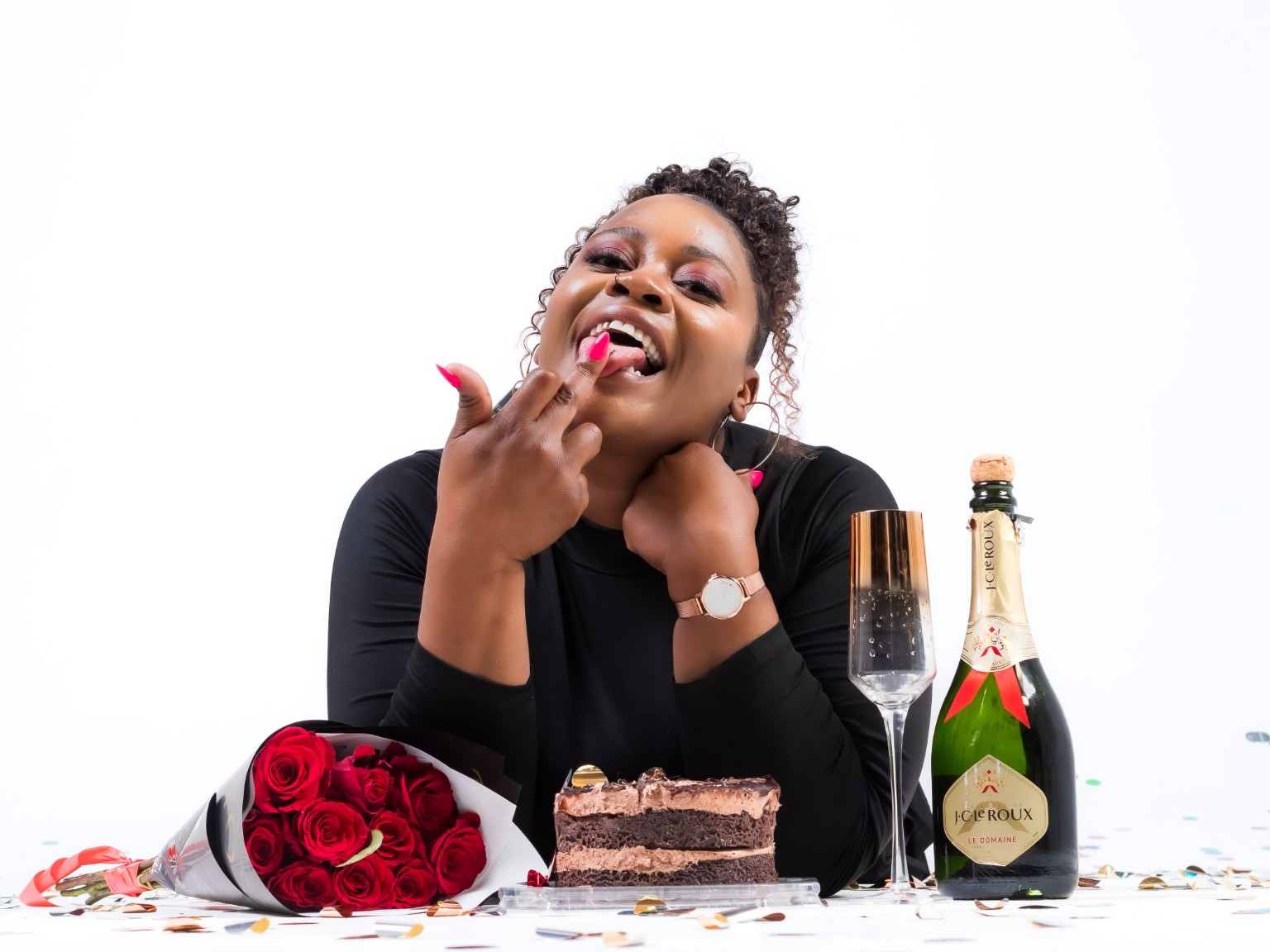 Celebration with cake, roses and champagne
